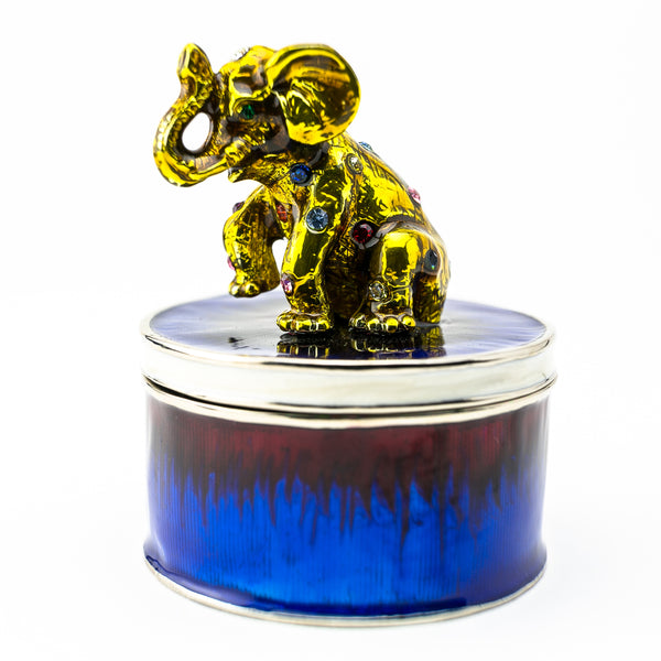 Éléphant doré sur Boîte à bijoux bleue