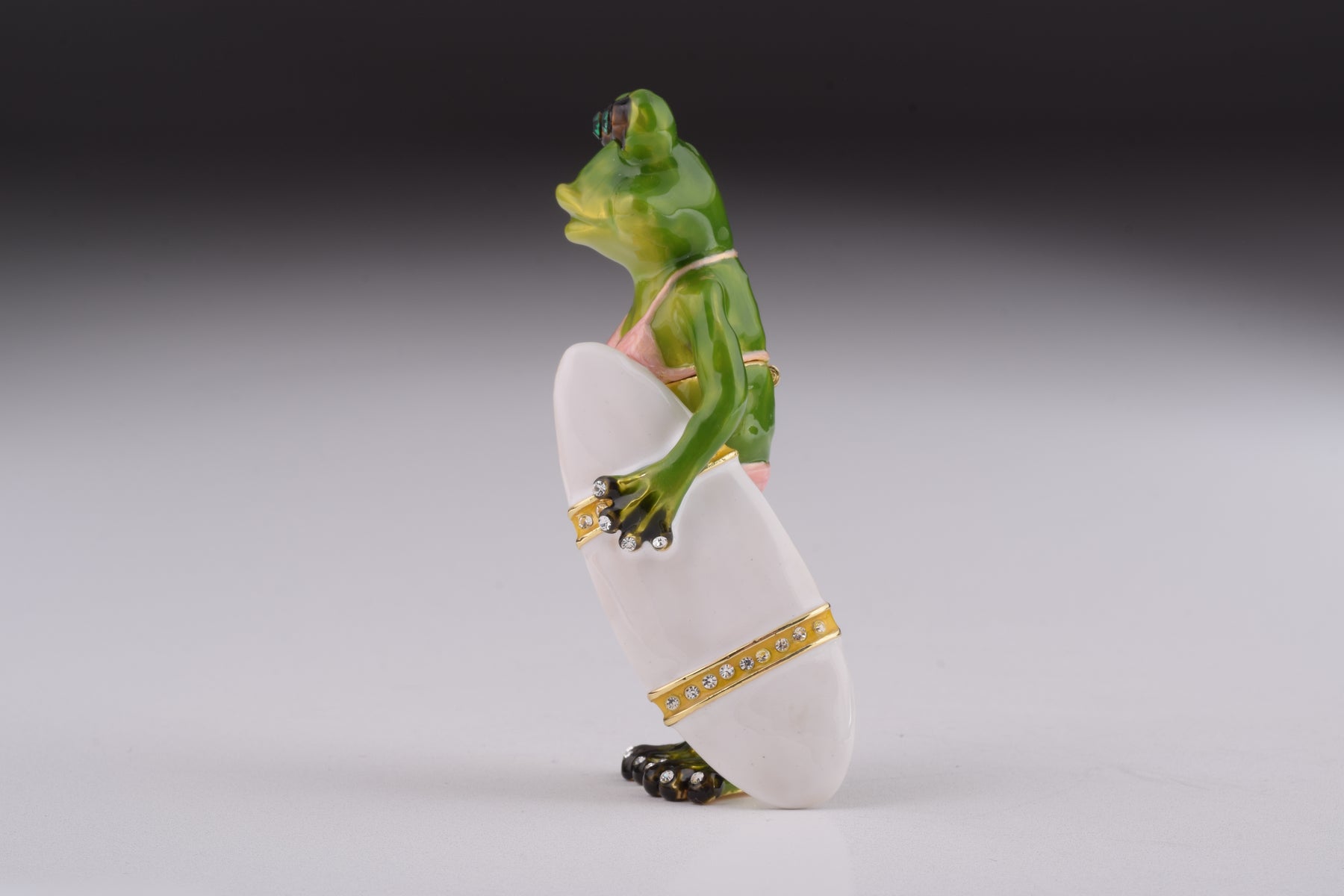 Keren Kopal Frog Holding a Surfboard