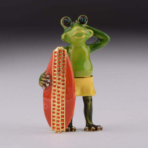 Grenouille tenant une planche de surf