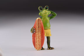Keren Kopal Frog Holding a Surfboard