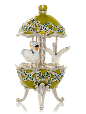 Green Wind Up Carousel with White Swans