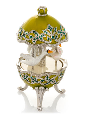 Green Wind Up Carousel with White Swans