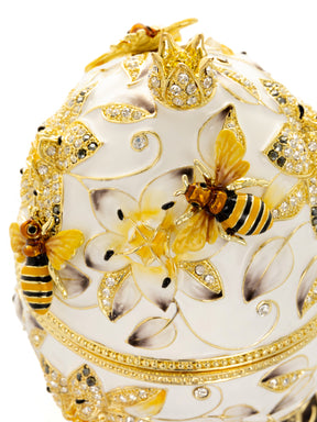 White Faberge Egg with Bees and Flowers