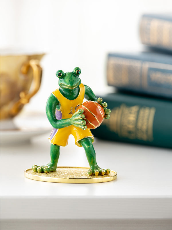 Grenouille jouant au basket-ball