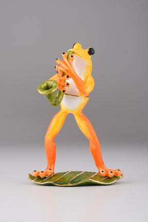 Keren Kopal Frog Playing a Saxophone