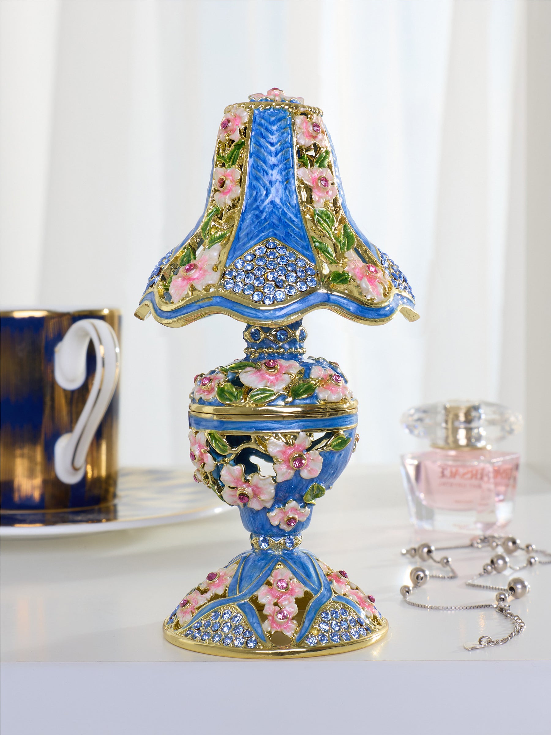 Königsblaue klassische Lampe mit rosa Blumen verziert
