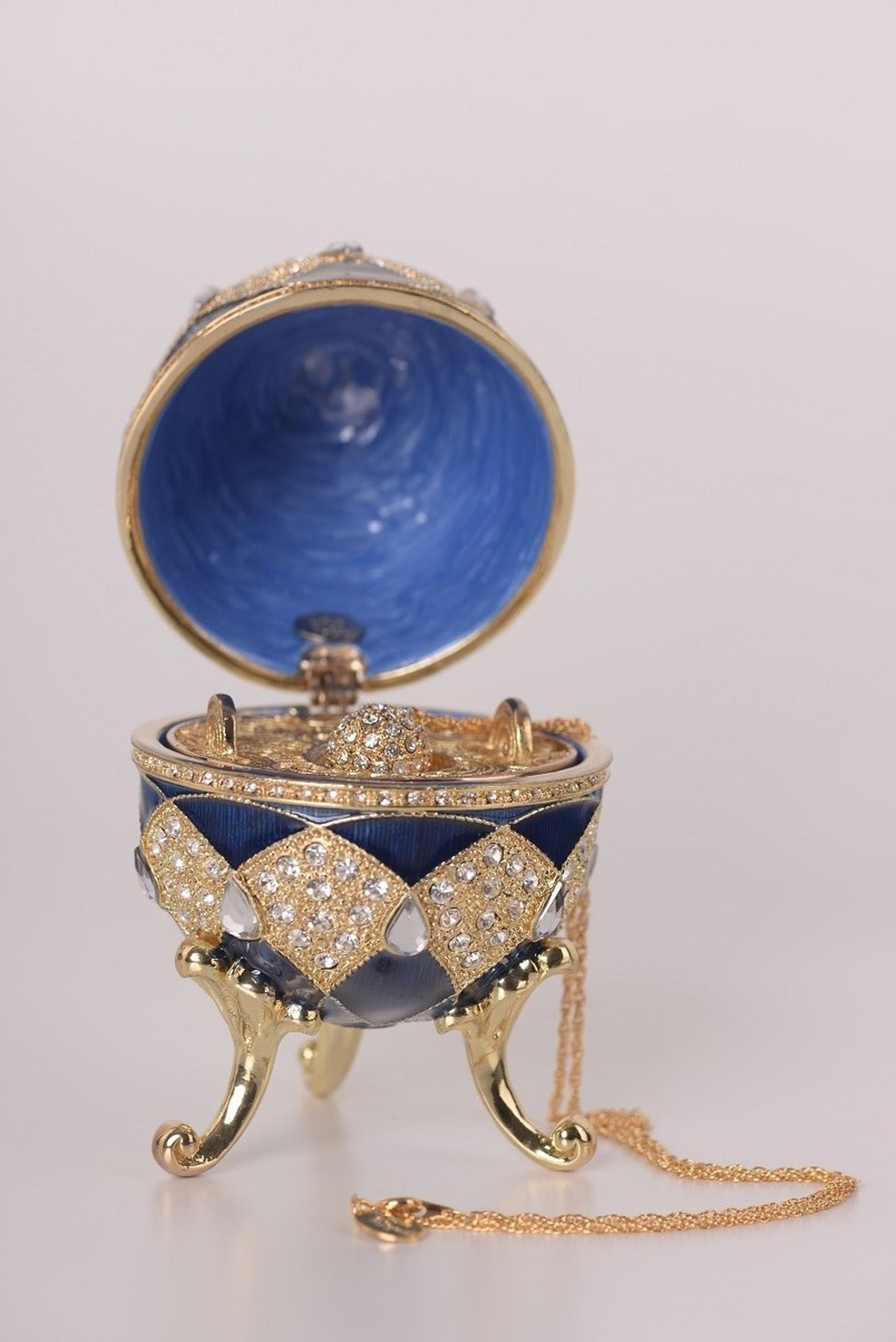 Blue Faberge Egg with Egg Pendant Inside