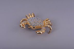 Golden Crab with blue stones