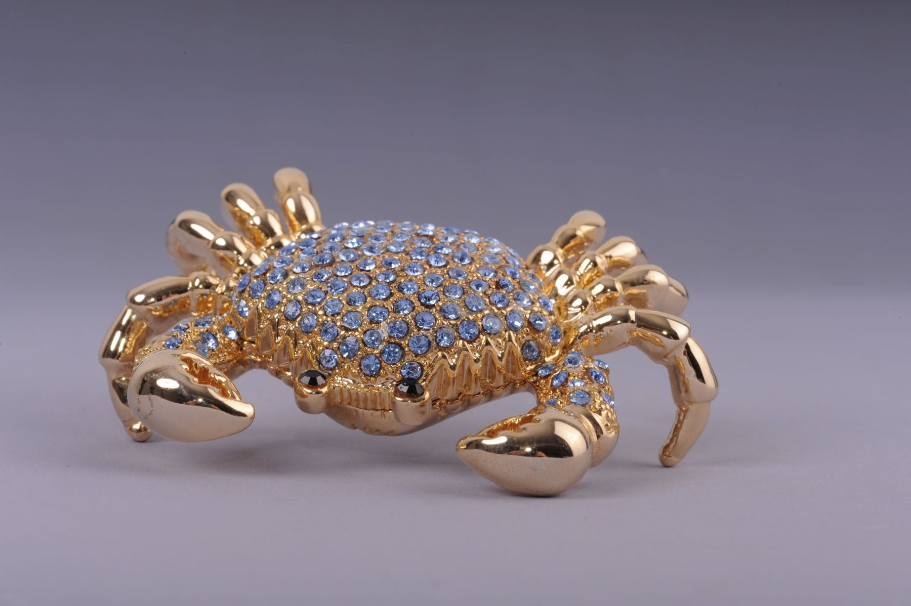 Golden Crab with blue stones