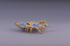 Golden Crab with blue stones