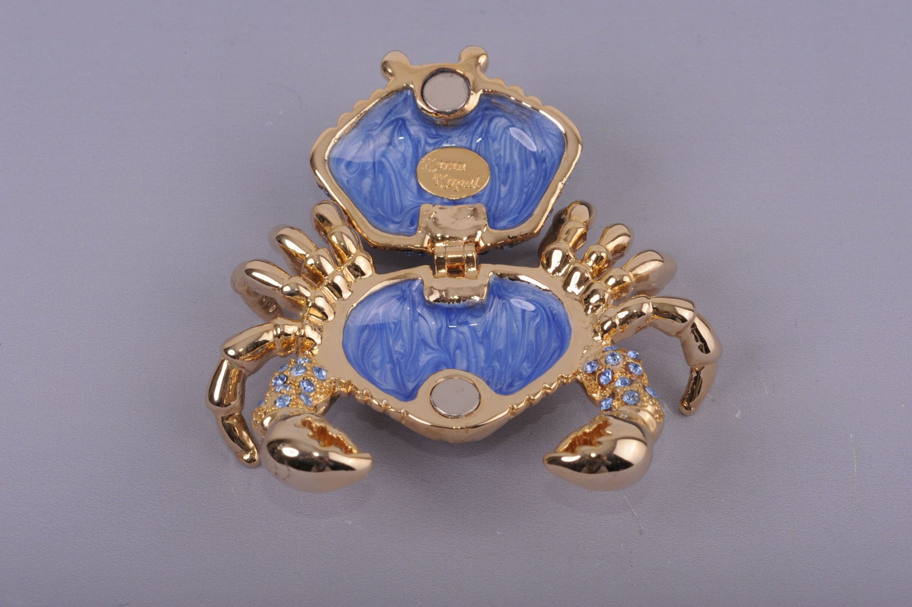 Golden Crab with blue stones