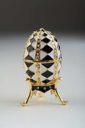 Black and White Faberge Egg with Gold Necklace Inside