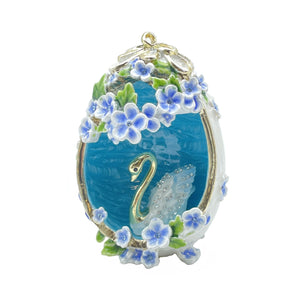 turquoise egg with a swan