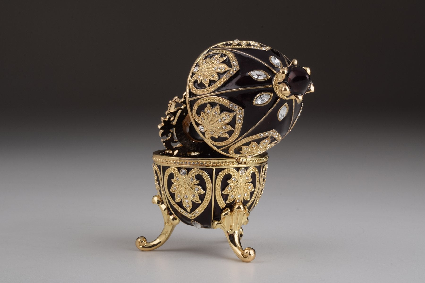 Keren Kopal Gold & Black Faberge Egg with Clock  124.00