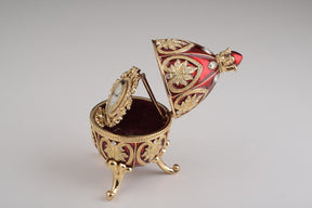 Keren Kopal Gold & Red Faberge Egg with Clock  124.00