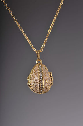 Keren Kopal Moccasin Egg Pendant with a Beetle  35.00