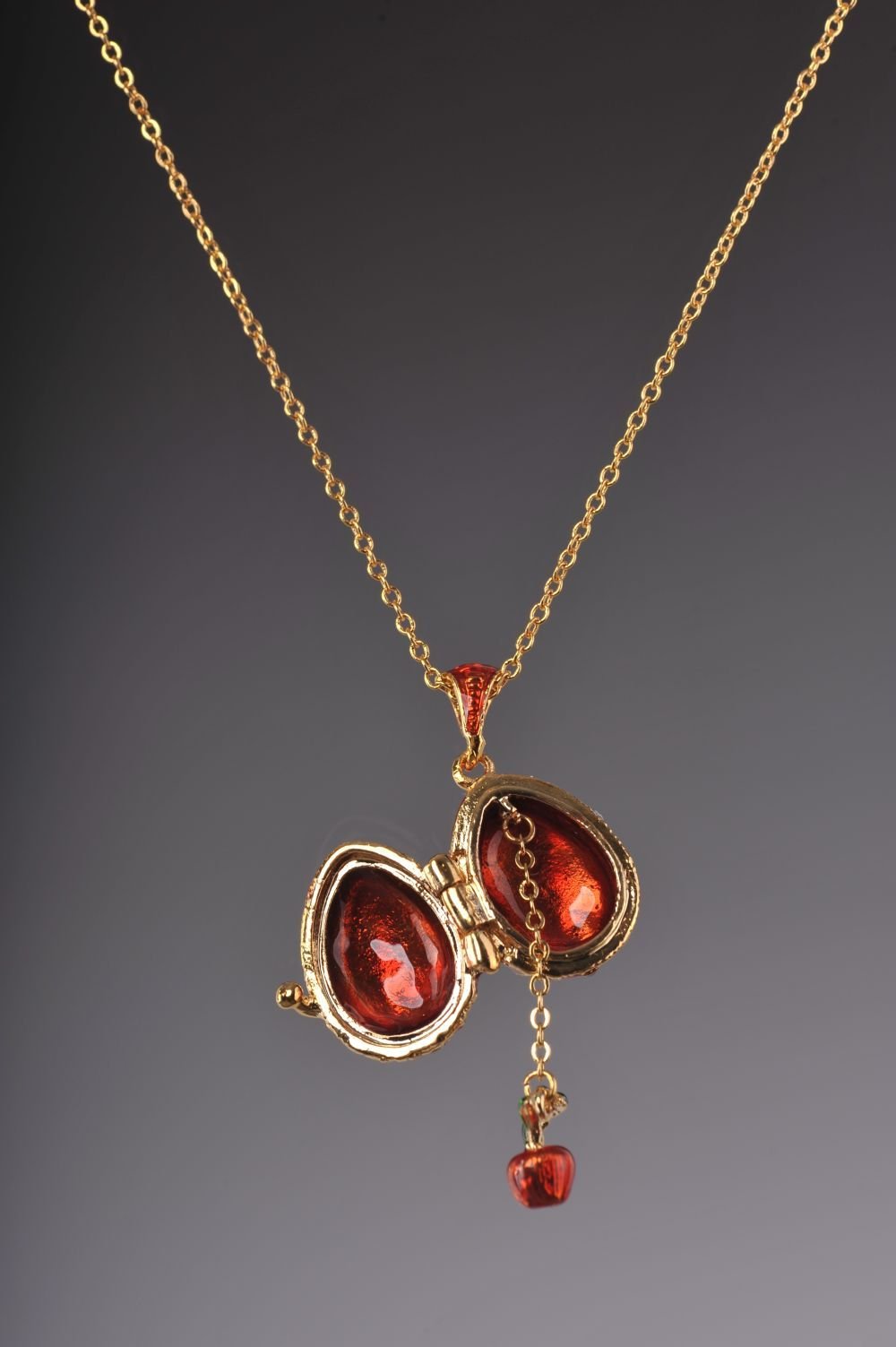 Keren Kopal Red Egg Pendant with a Surprise Apple Inside  36.00