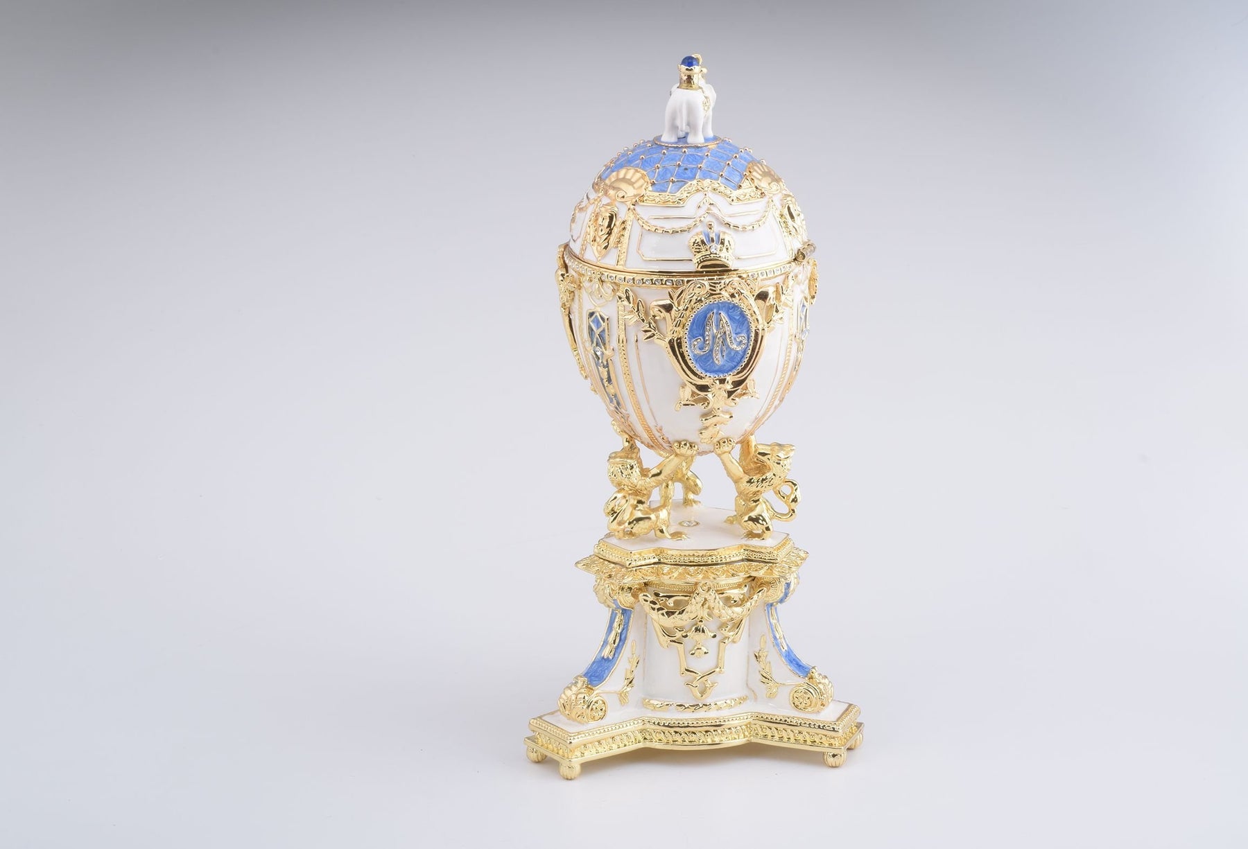 Keren Kopal White Faberge Egg with an Elephant on Top  344.00