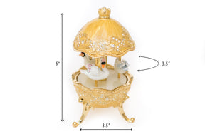 Keren Kopal Yellow Carousel Egg with White Swans  126.50