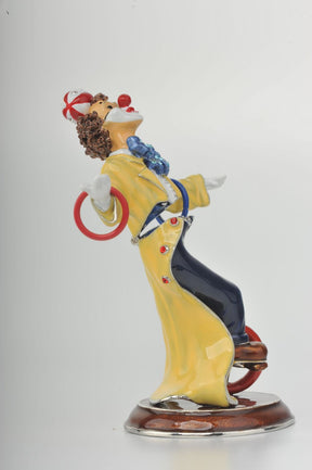 Yellow Circus Clown Juggling on Unicycle  Keren Kopal